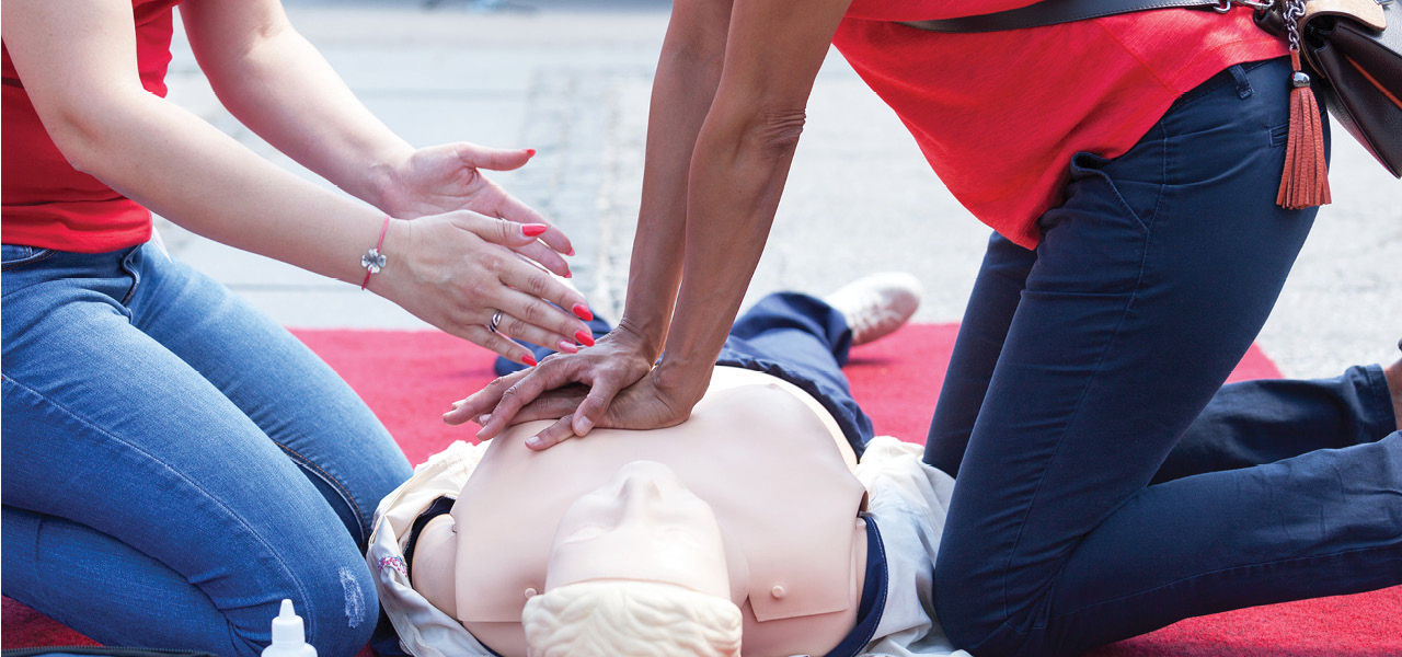 cpr training being demonstrated on a dummy 