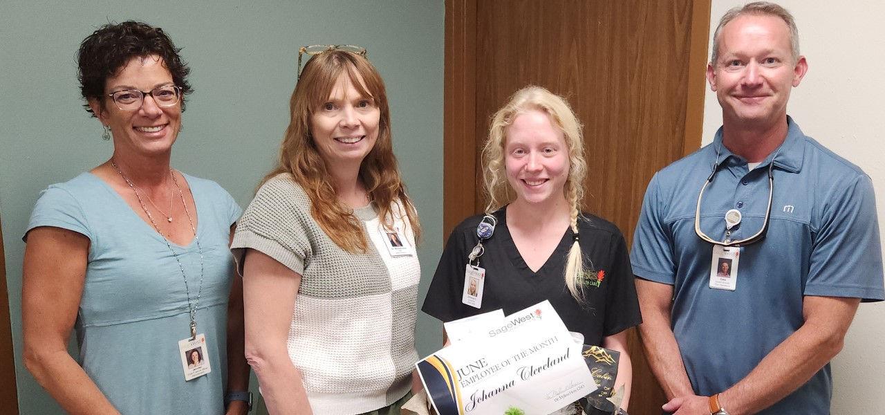 Johanna Cleveland receiving employee of the month award