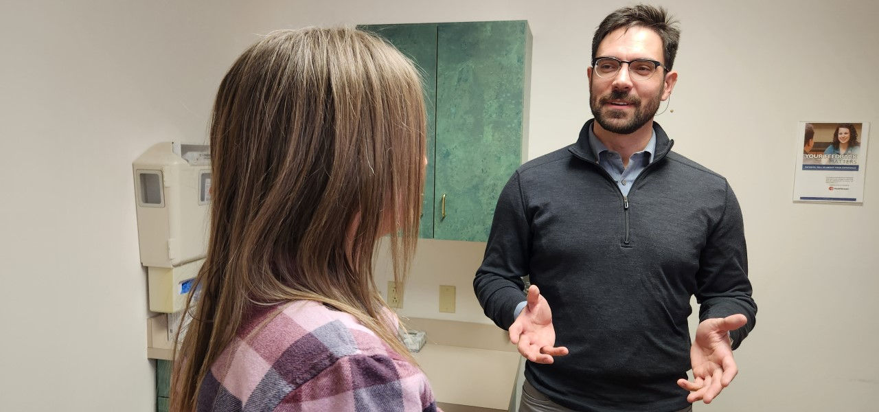 Dr. Ben Roose with patient