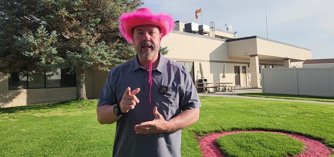 Man with pink hat