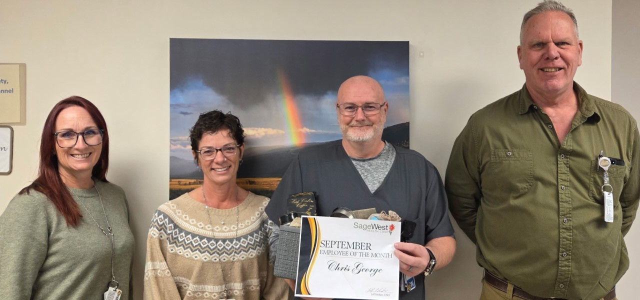 SageWest September 2025 Employee of the Month Chris George, RN, Nurse Supervisor poses with his awared with our medical staff coordinator, our CFO, and our CNO